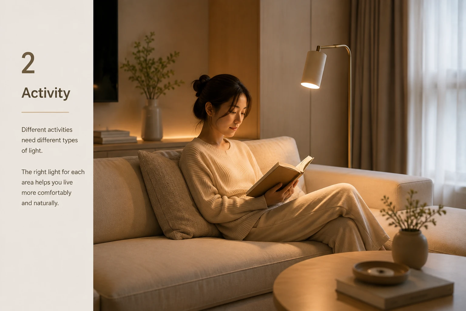 Person reading under focused task lighting in a warm Japandi living room